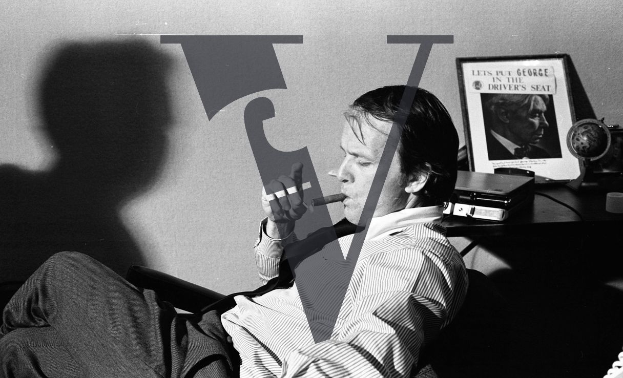 George Stevens Jr., portrait, cigar, shadow.