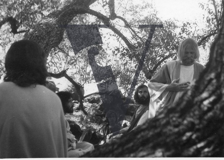 The Gospel Road, production stills, Robert Elfstrom, Jesus, preaching, black and white, behind tree.