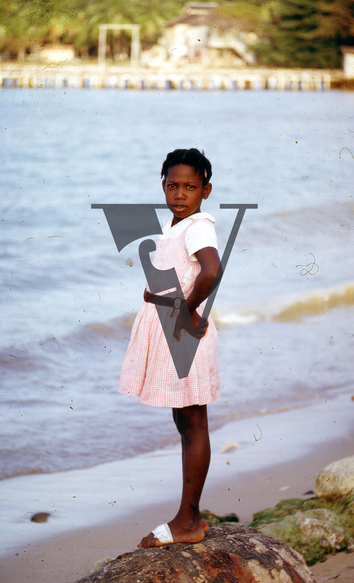 Jamaica, Girl on beach portrait.