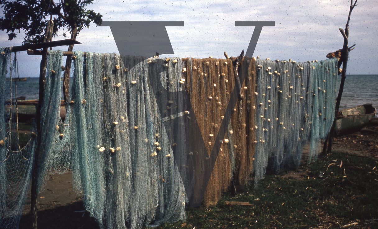 Jamaica, Fishing nets drying by the sea.