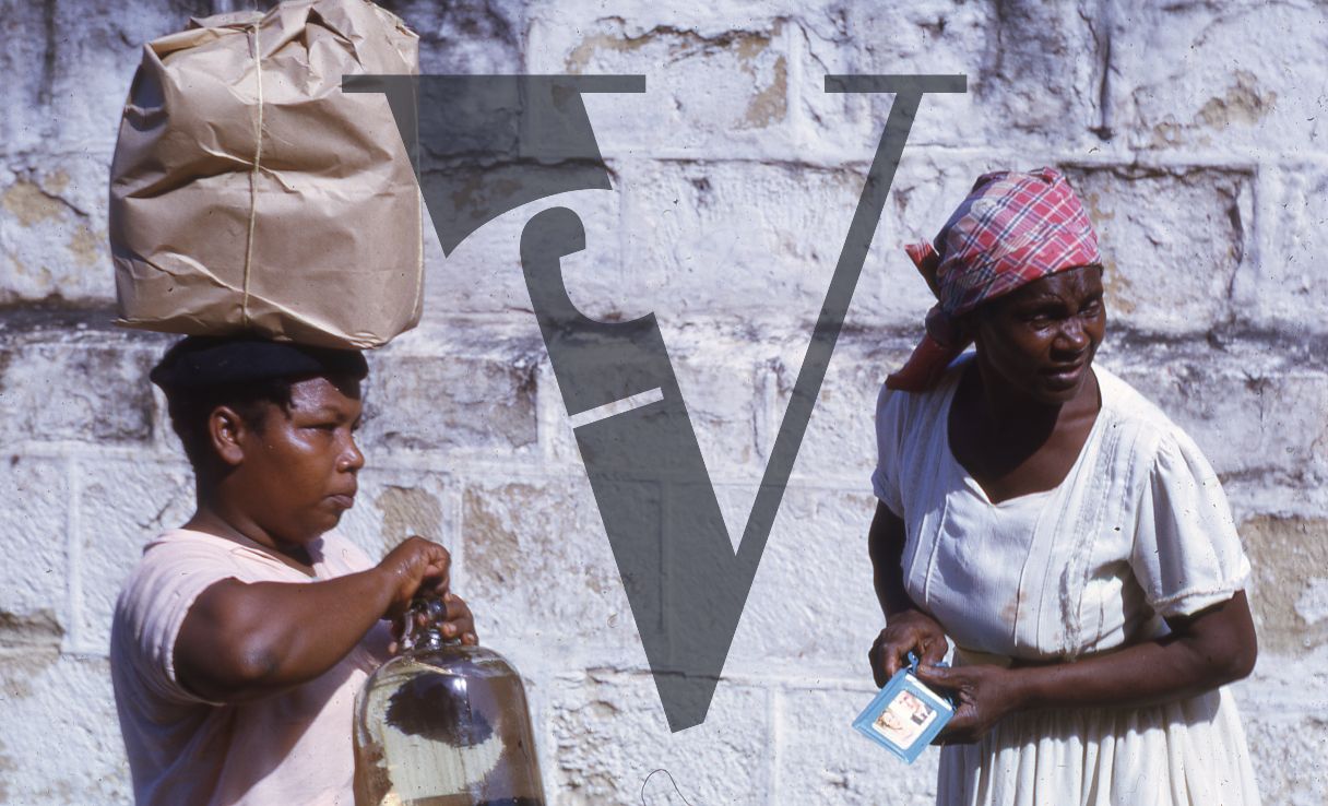 Jamaica, Woman with groceries on head.