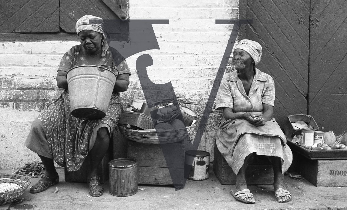 Jamaica, Elderly women sit around.