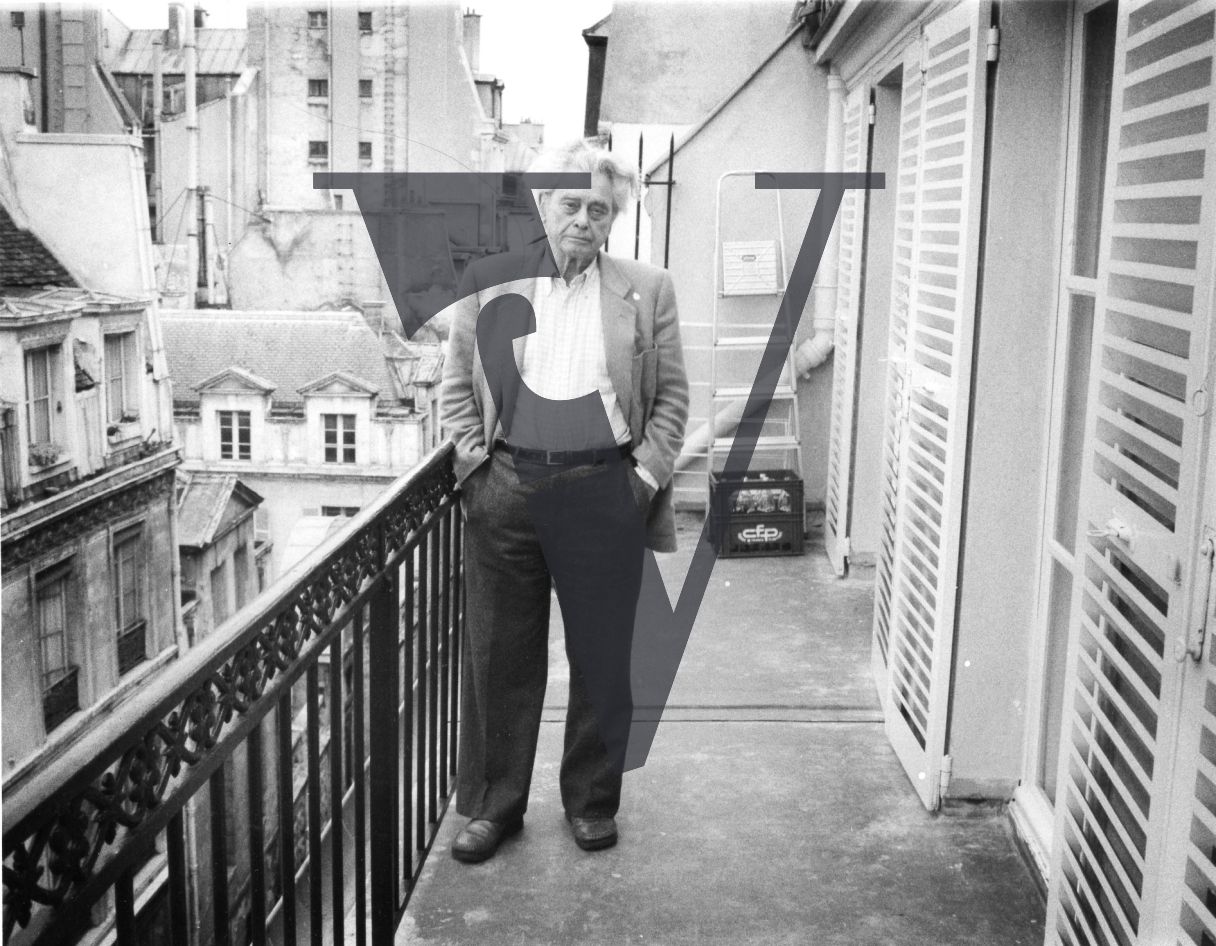 Joris Ivens, portrait, on balcony.